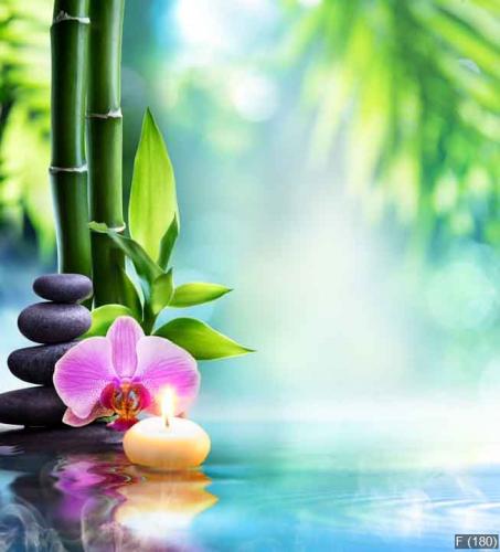 spa still life - candle and stone with bamboo in nature on water
