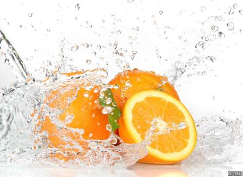 Orange fruits with Splashing water