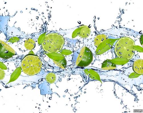 Fresh limes in water splash,isolated on white background