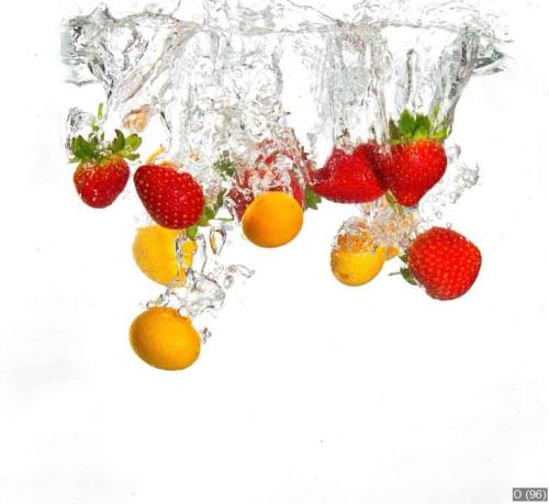 Strawberries and oranges falling