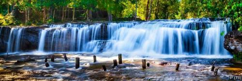 Tropical waterfall in jungle with motion blur