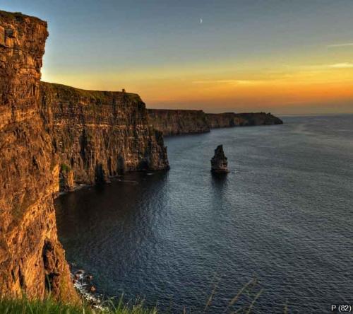 famous cliffs of moher, sunset, county clare, ireland